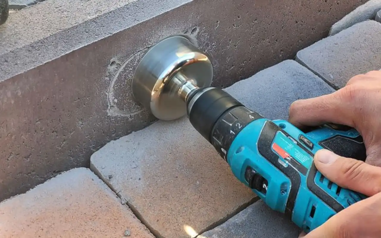 Precision diamond core drilling in process on concrete structure